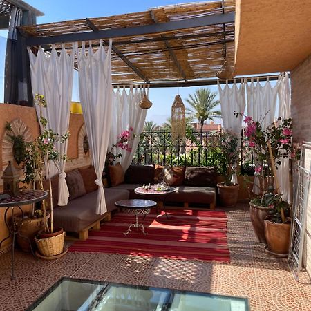 Riad Palmier Fleuri مراكش المظهر الخارجي الصورة