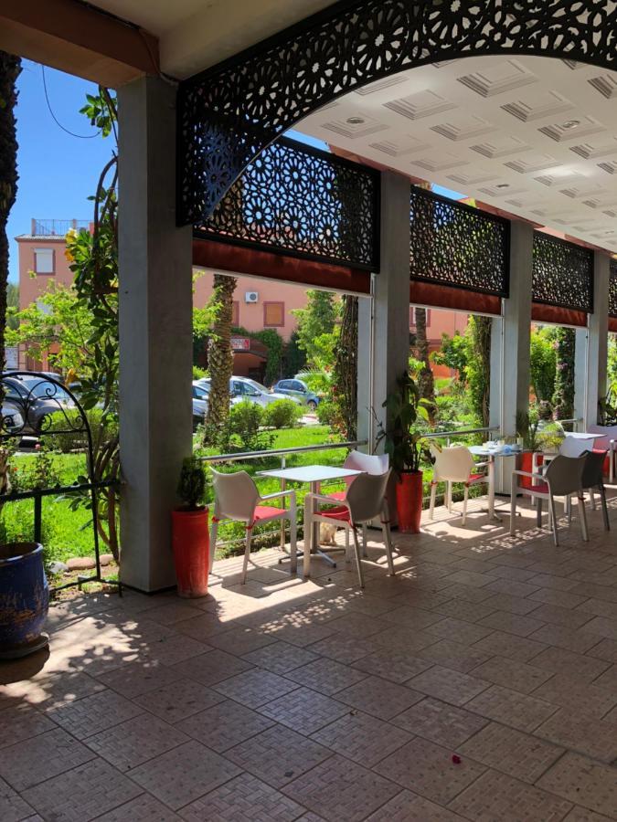 Riad Palmier Fleuri مراكش المظهر الخارجي الصورة