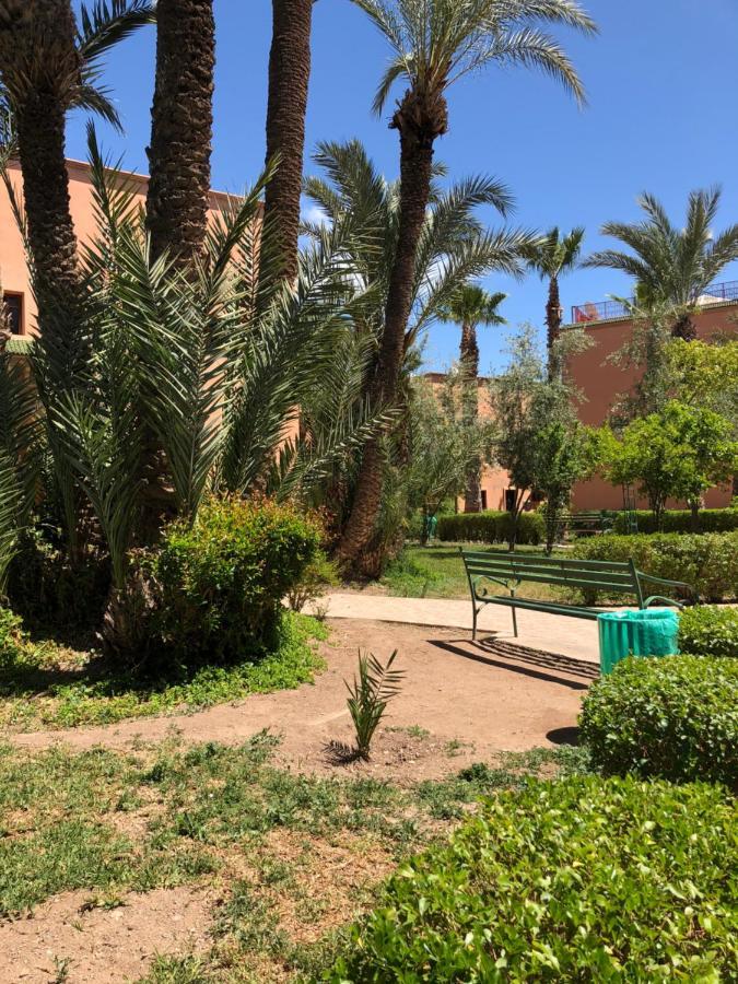 Riad Palmier Fleuri مراكش المظهر الخارجي الصورة