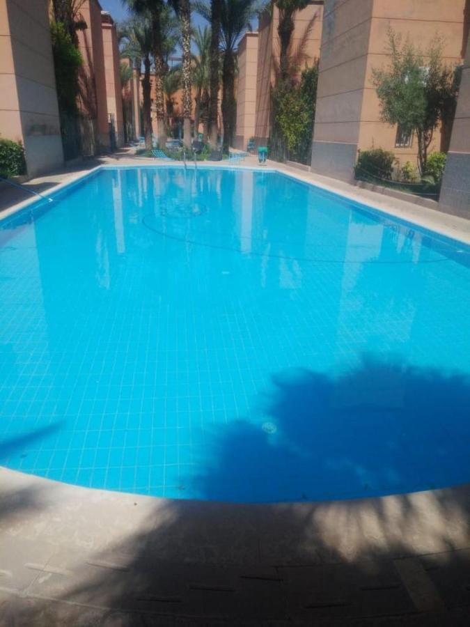 Riad Palmier Fleuri مراكش المظهر الخارجي الصورة