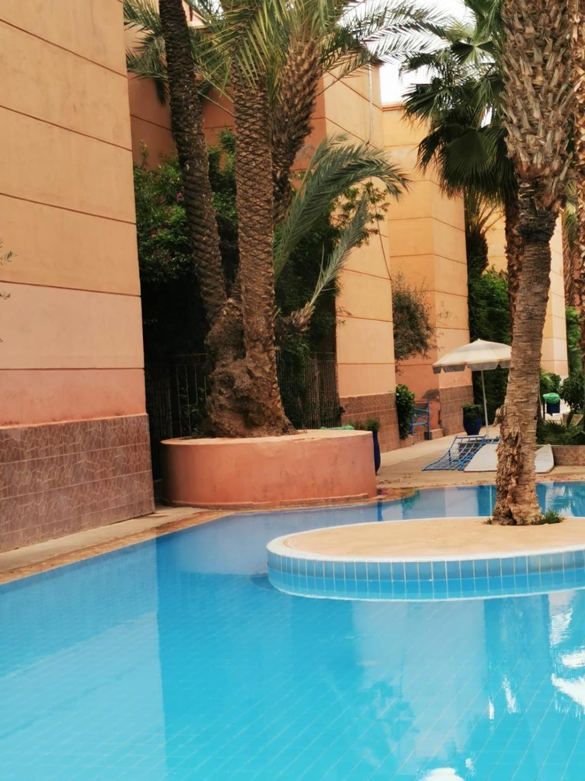 Riad Palmier Fleuri مراكش المظهر الخارجي الصورة