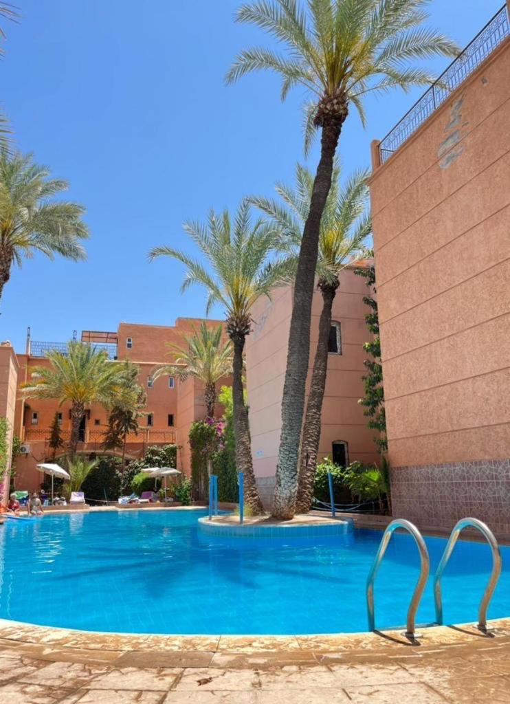 Riad Palmier Fleuri مراكش المظهر الخارجي الصورة