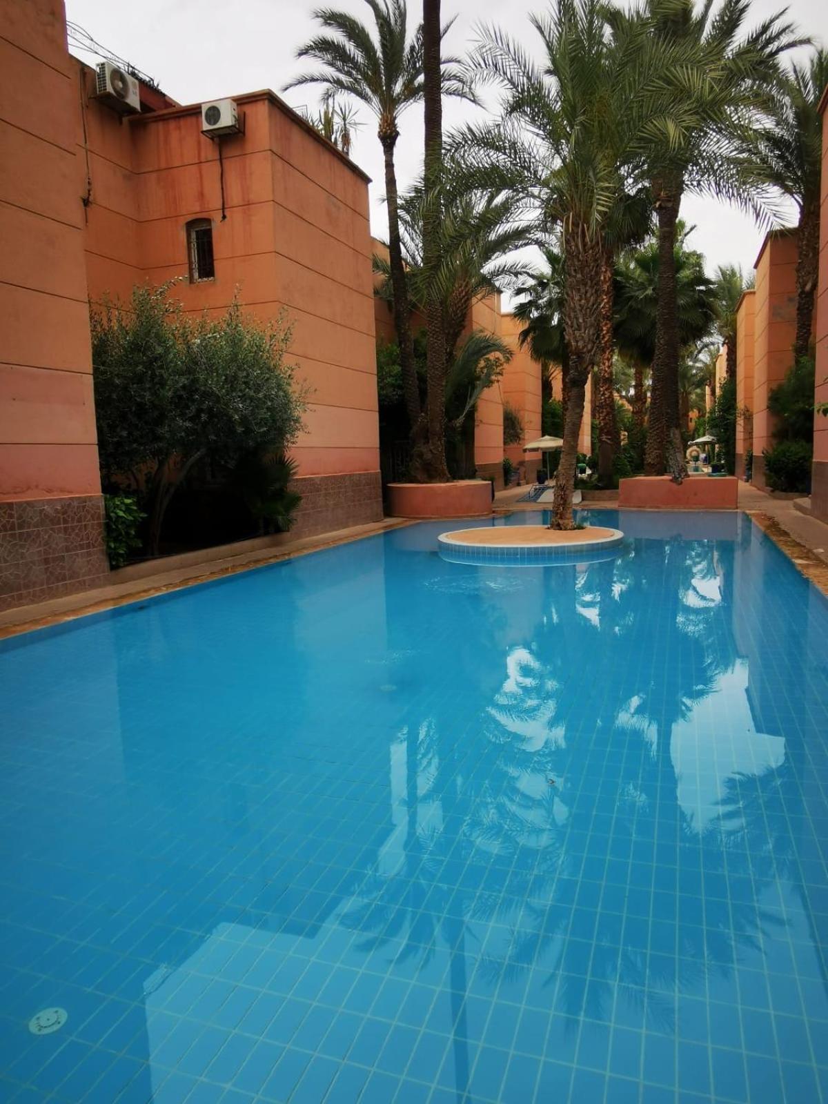 Riad Palmier Fleuri مراكش المظهر الخارجي الصورة